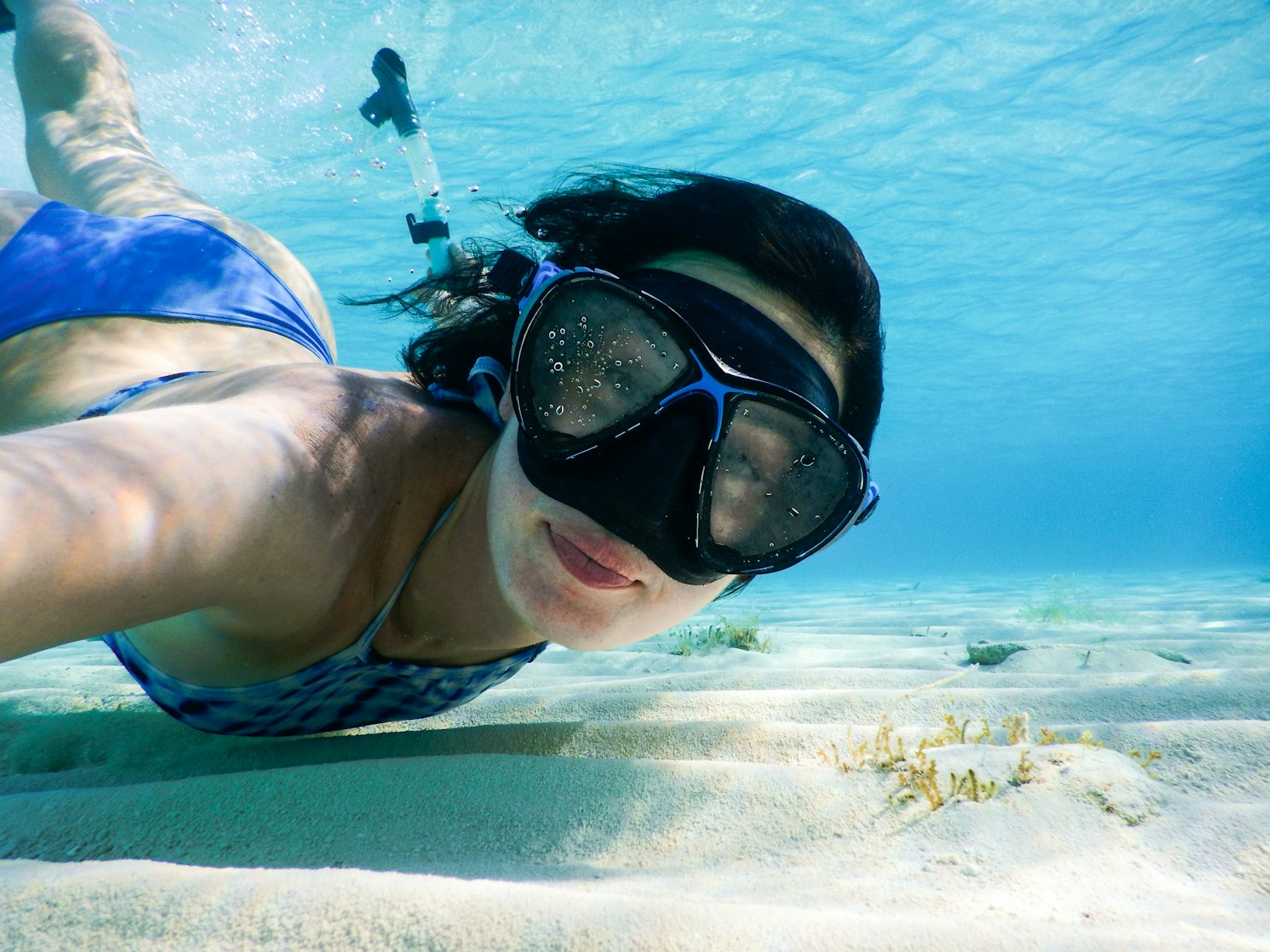 Snorkeler under clear water