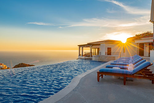Resort pool at sunset